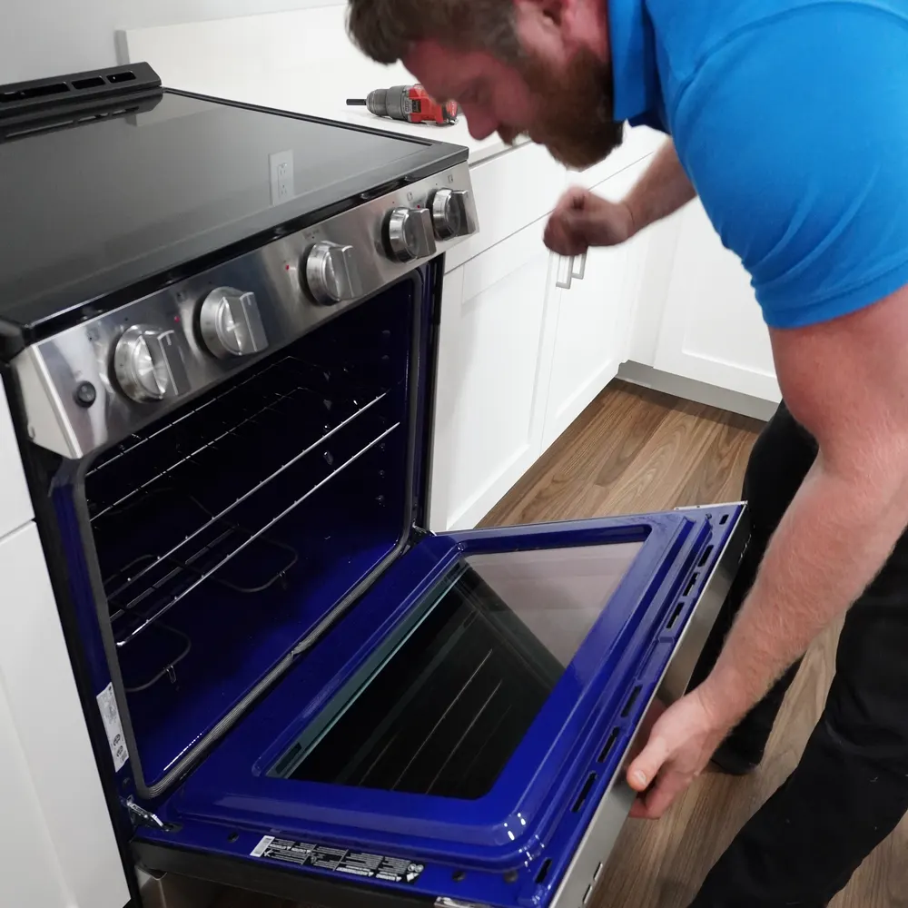 Oven interior rack and door hinge serviced during a repair visit