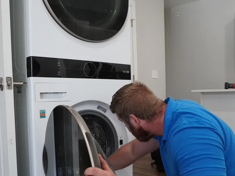 Washing machine door removed to access the drum during a repair visit